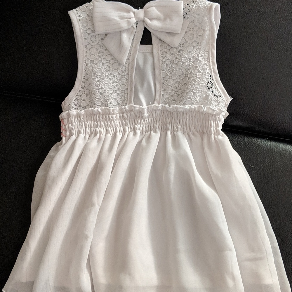 Little lass white shirt with pink shorts